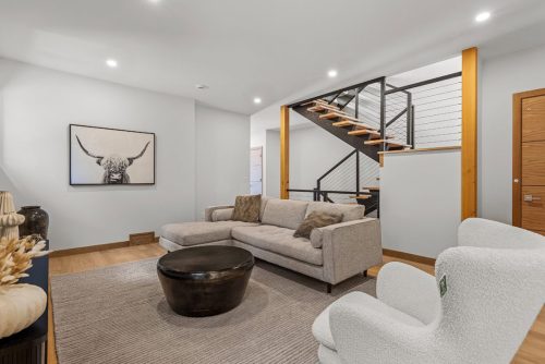 288A Three Sisters Drive downstairs living room with stairwell