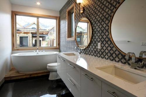 New construction Canmore polished concrete floors hickory trim industrial contemporary design patterned tiles new construction bathroom 