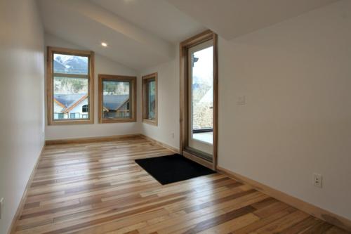 New construction Canmore hickory wood floors contemporary industrial design 