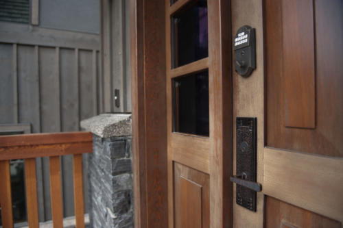 New construction Banff Canmore timberframe wood frontdoor contemporary industrial design 