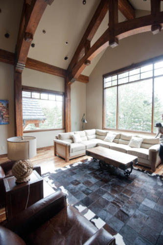 New construction Banff Canmore living room hardwood floors timberframe contemporary industrial design 