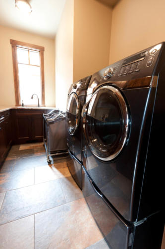 New construction Banff Canmore laundry room hardwood floors timberframe contemporary industrial design 