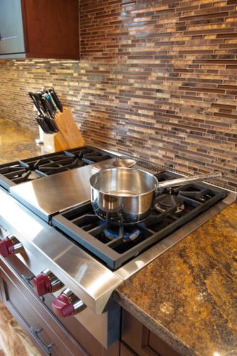 New construction Banff Canmore kitchen  timberframe contemporary industrial design metal wood granite counter tops tile backsplash 