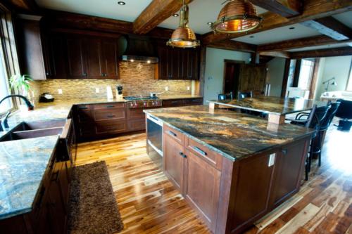 New construction Banff Canmore kitchen  timberframe contemporary industrial design metal wood granite counter tops copper apron kitchen sink 