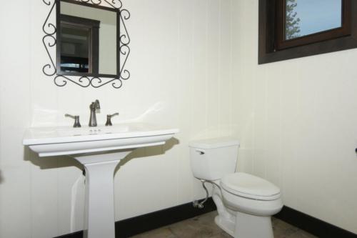 New construction Banff Canmore bathroom open concept hardwood floors timberframe wood contemporary industrial wainscoting walls 