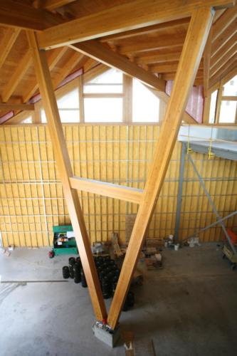 New construction Banff Canmore timberframe commercial brewery open concept wood concrete floors contemporary industrial wood stairs metal railings steel beams